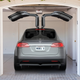 Illustration for article titled How The Tesla Model Xs Falcon Wing Doors May Well Ruin The Company